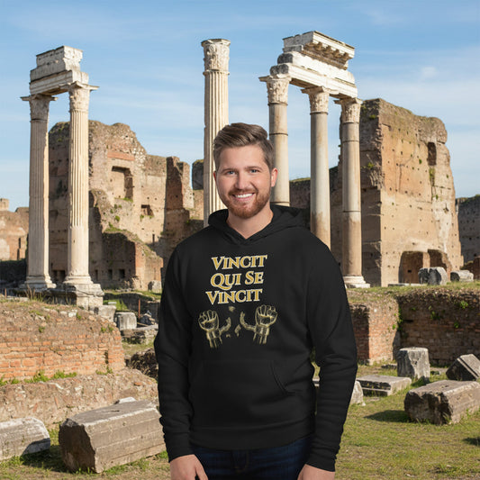 man wearing vincit qui se vincit hoodie