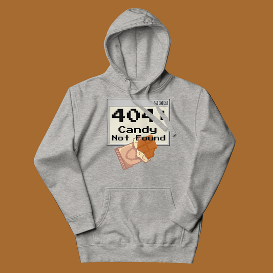 A light heather gray pullover hoodie featuring a '404 Candy Not Found' graphic print on the chest, displayed against a solid white background.