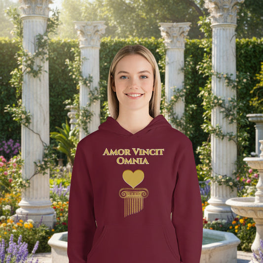 woman wearing amor vincit omnia hoodie