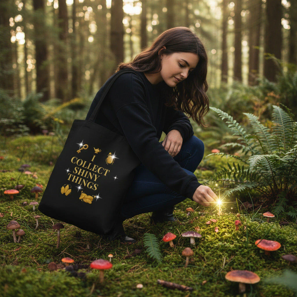 woman holding i collect shiny things eco tote bag