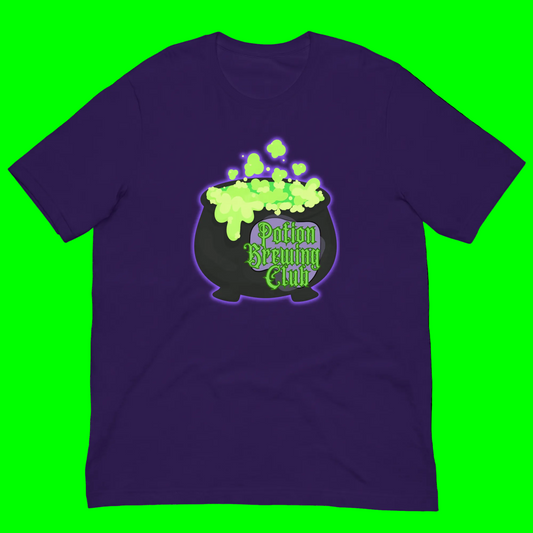 A dark purple short-sleeve crewneck t-shirt featuring a graphic of a black cauldron filled with glowing neon green slime, with the text 'Potion Brewing Club' in green stylized lettering.