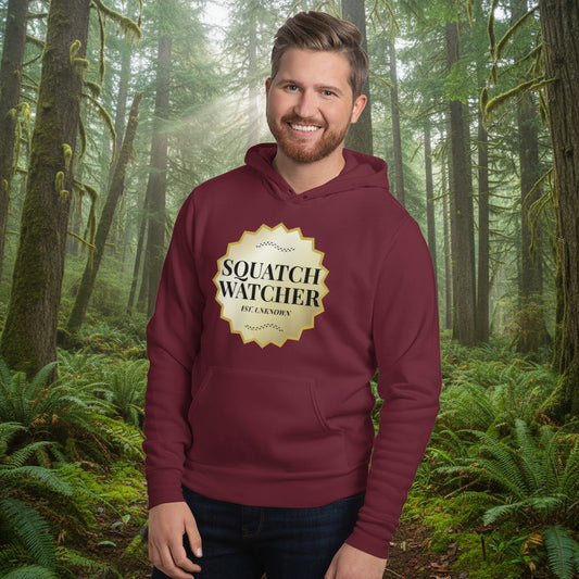 man wearing squatch watcher hoodie