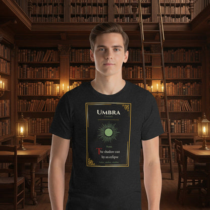 Umbra Lost Lexicon rare word graphic tee — gold manuscript eclipse design on black heather — Stitch and Sigil