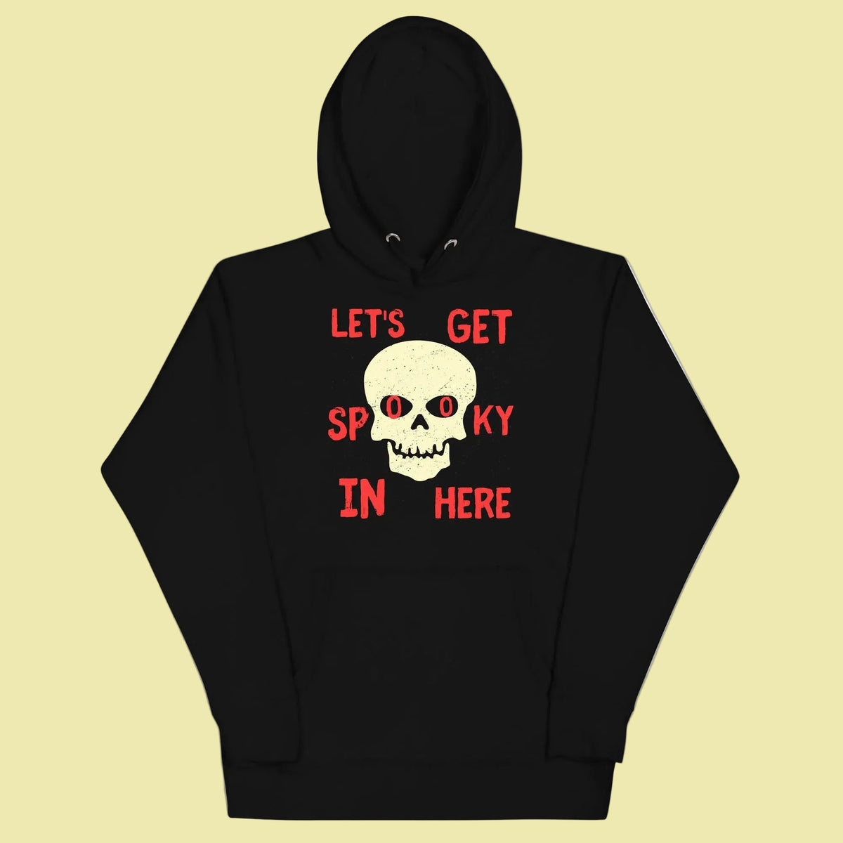 hoodie with text lets get spooky in here centered around a skull