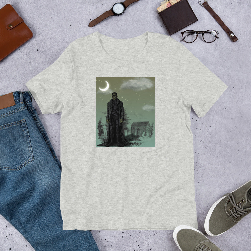 Frankenstein Monster Moonlit Graveyard horror graphic tee — graveyard monster design on athletic heather — Stitch and Sigil