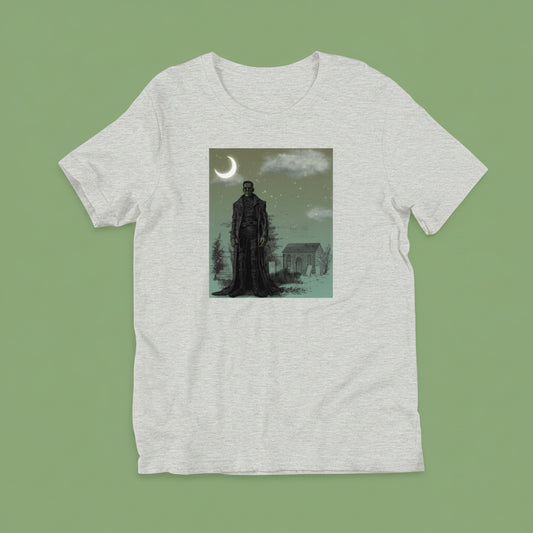 Frankenstein Monster Moonlit Graveyard horror graphic tee — graveyard monster design on athletic heather — Stitch and Sigil
