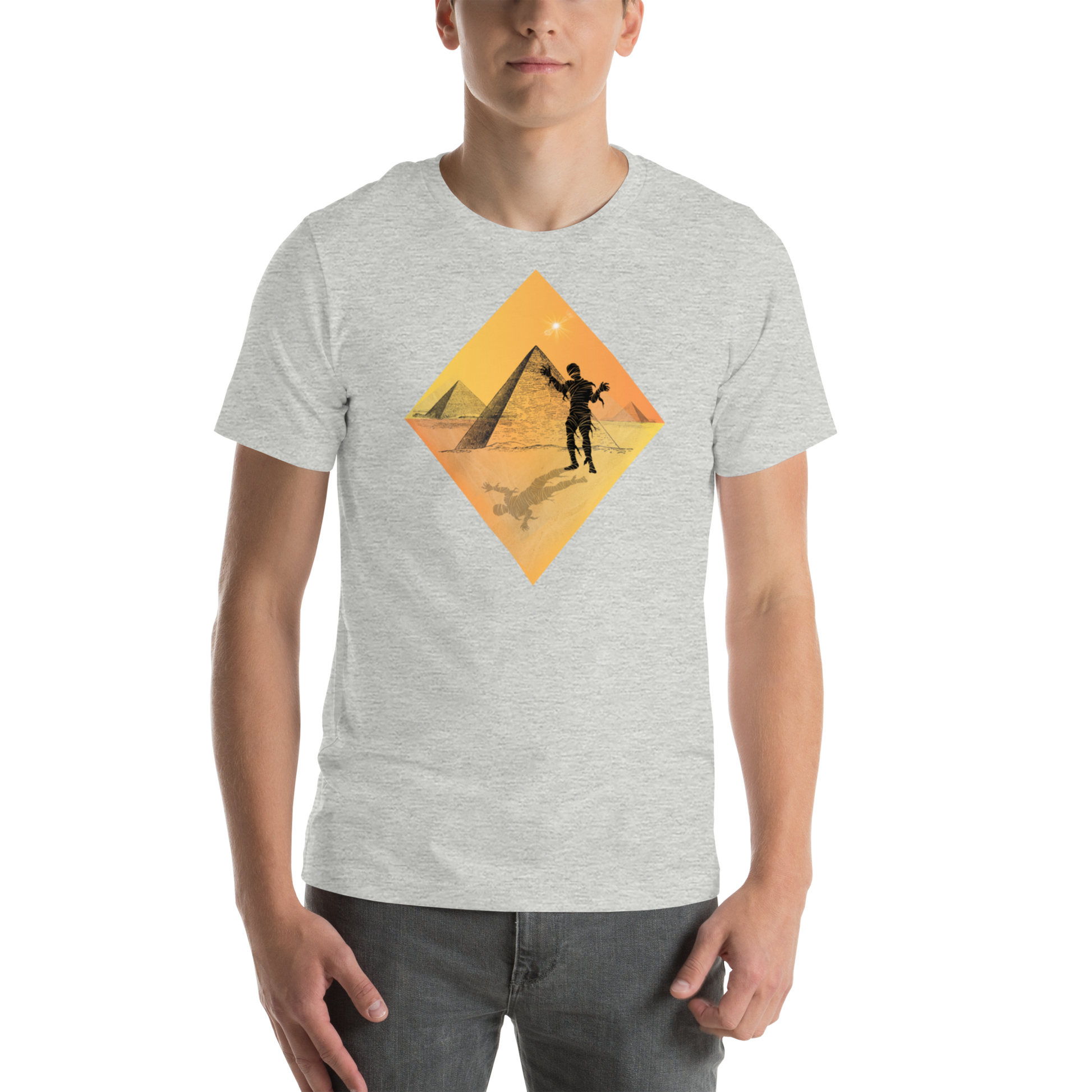 The Mummy In the Shadow of the Pyramids horror graphic tee — Egyptian mummy design on athletic heather — Stitch and Sigil