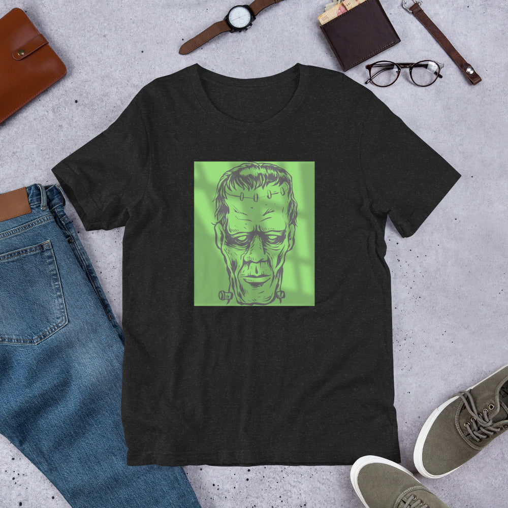 Shot in the Dark Frankenstein glow in dark graphic tee — Frankenstein design on black heather — Stitch and Sigil