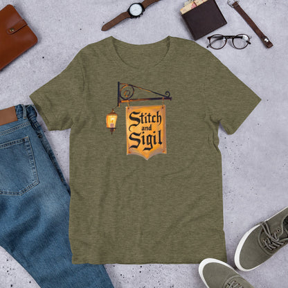 Stitch and Sigil logo graphic tee — brand sign design on heather olive — Stitch and Sigil